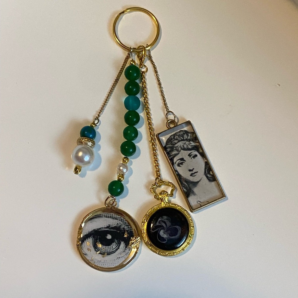 NEW FORNASETTI INSPIRED BAG CHARM PURSE KEYCHAIN GOLD GREEN BLACK DESIGNER READY - Picture 7 of 8